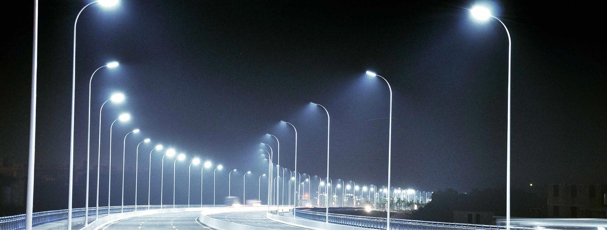 New LED street lights illuminating a Hialeah roadway at night