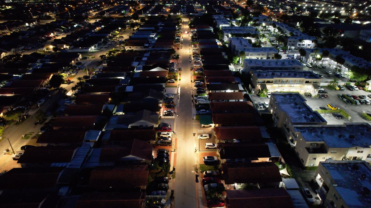New LED street lights installed across a Hialeah neighborhood at night